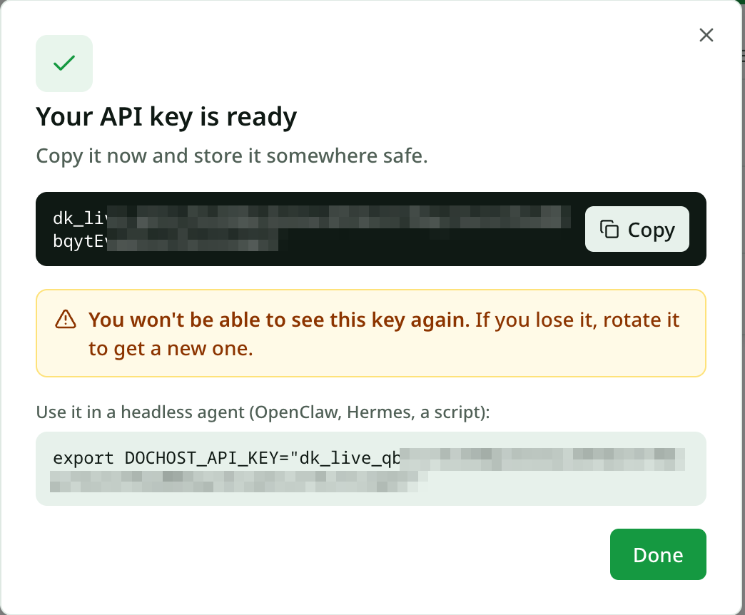 Your API key is ready: the key shown once with a Copy button, a warning that it cannot be shown again, and the export line for a shell